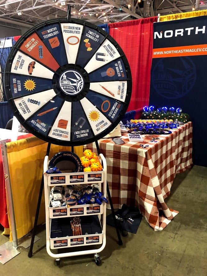 Northeast Maglev prize wheel and table at the Maryland Association of Counties Summer 2019 Conference