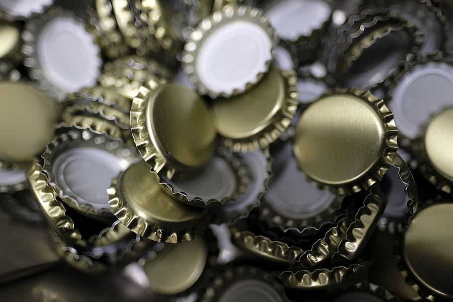 Up close photo of metal bottle caps