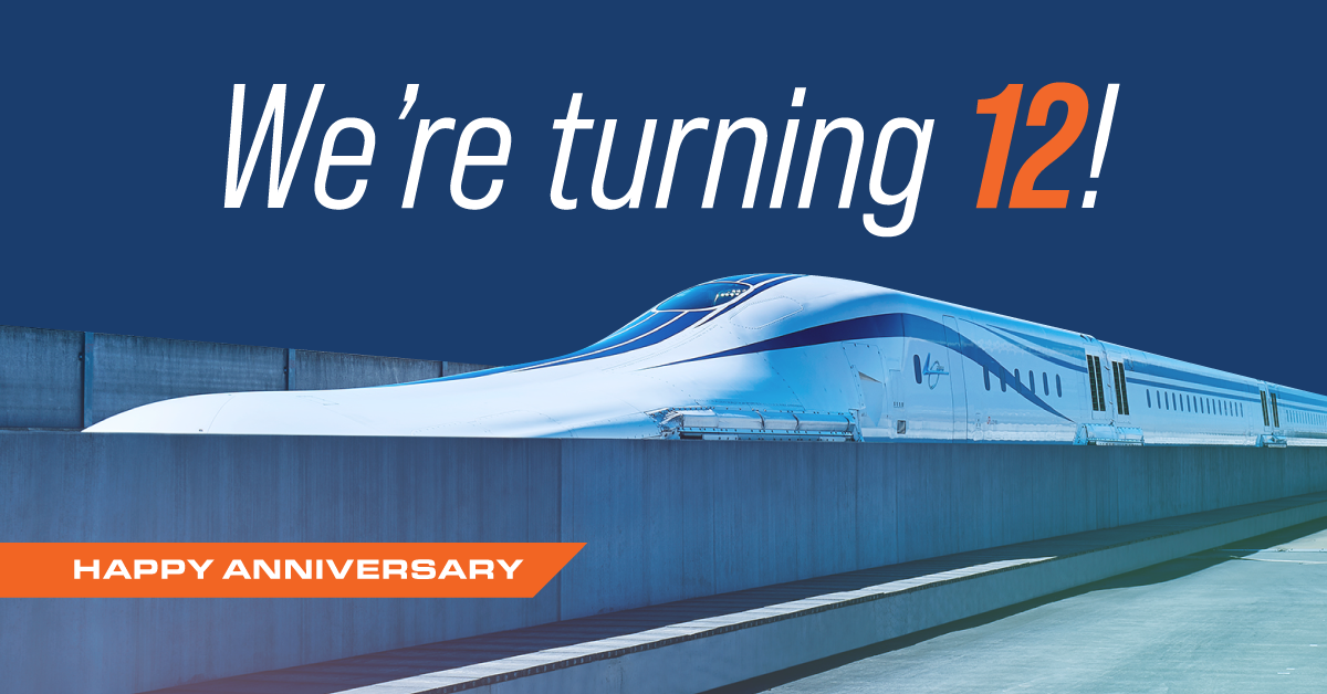 Stylized photograph of the superconducting maglev with a title reading, we're turning 12 - happy anniversary