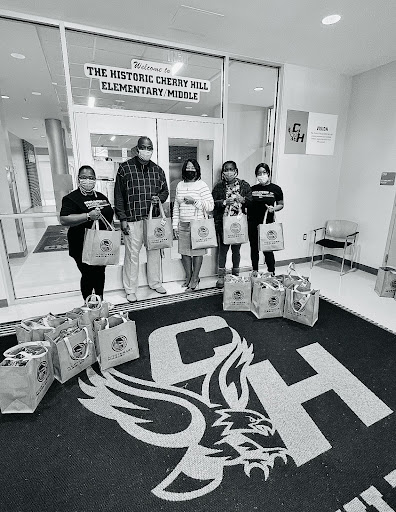 Northeast Maglev employees along with Cherry Hill Elementary Middle School staff with 3,000 donated COVID facemasks