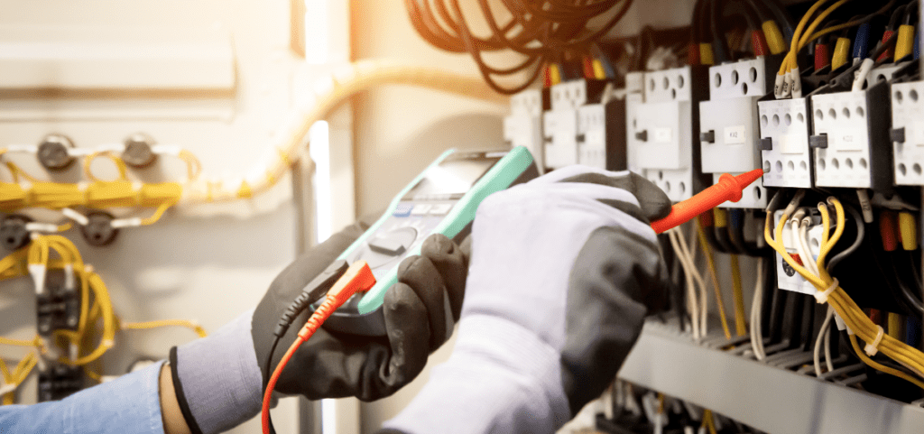 Electrical engineer measuring voltage